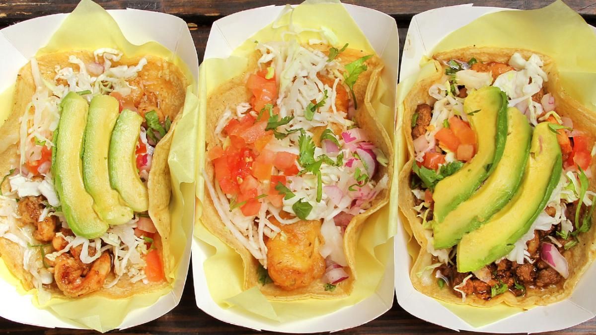 Golden San Diego sun illuminates a perfect fish taco, evoking coastal joy and taco obsession.