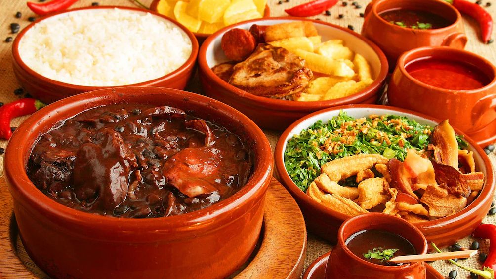 Vibrant Rio de Janeiro eatery, warm sunlight, savory feijoada, a culinary adventure.