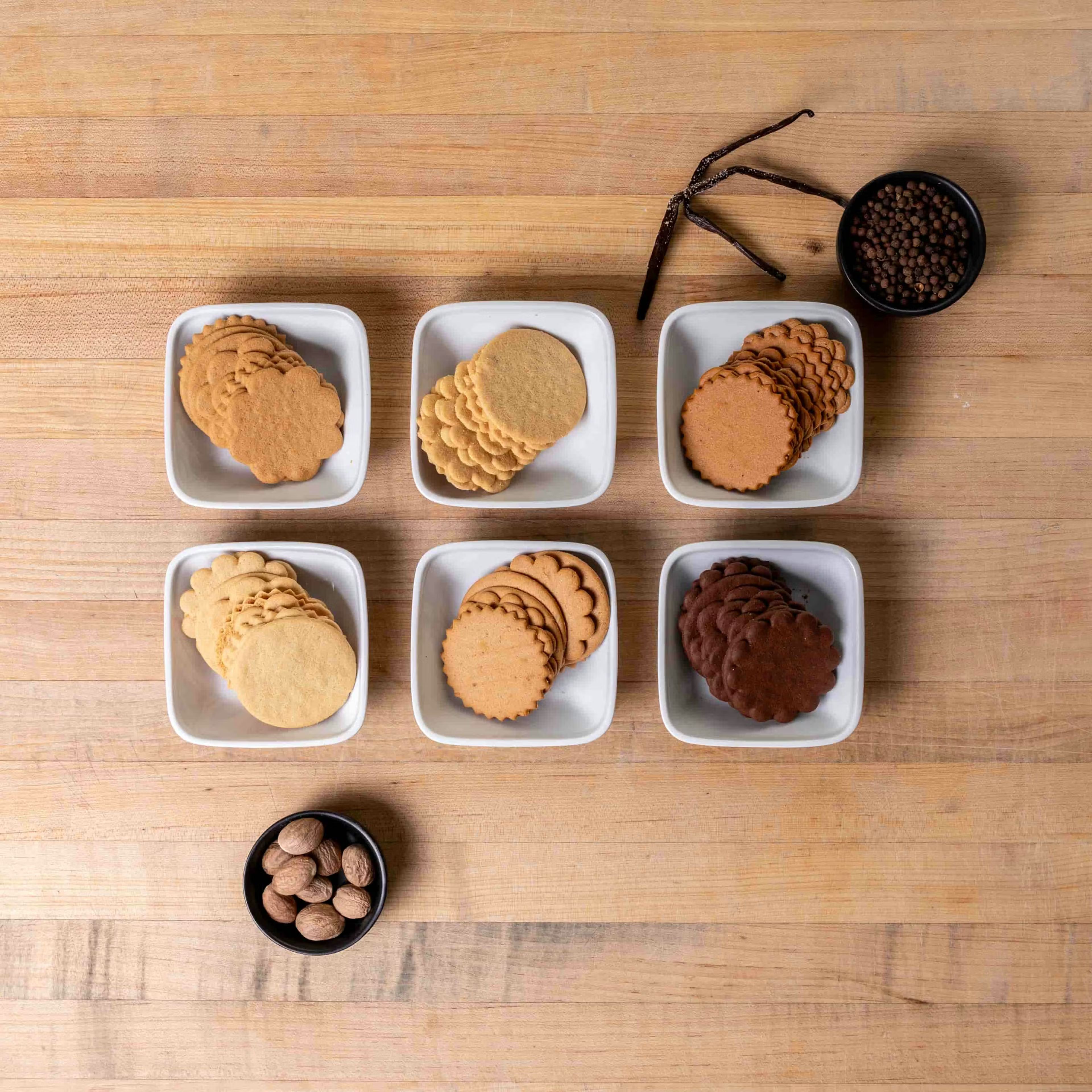 Warm, rustic kitchen glow, spiced Moravian cookies cooling, hinting at Winston-Salem's flavorful controversy.