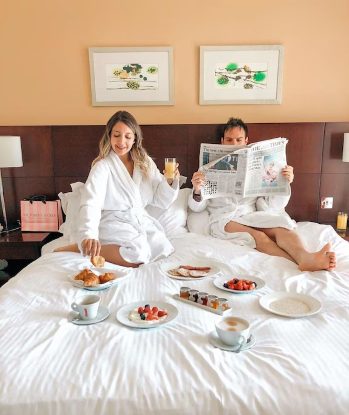 Luxurious European hotel suite, bathed in soft, inviting light, evoking opulent travel discovery.