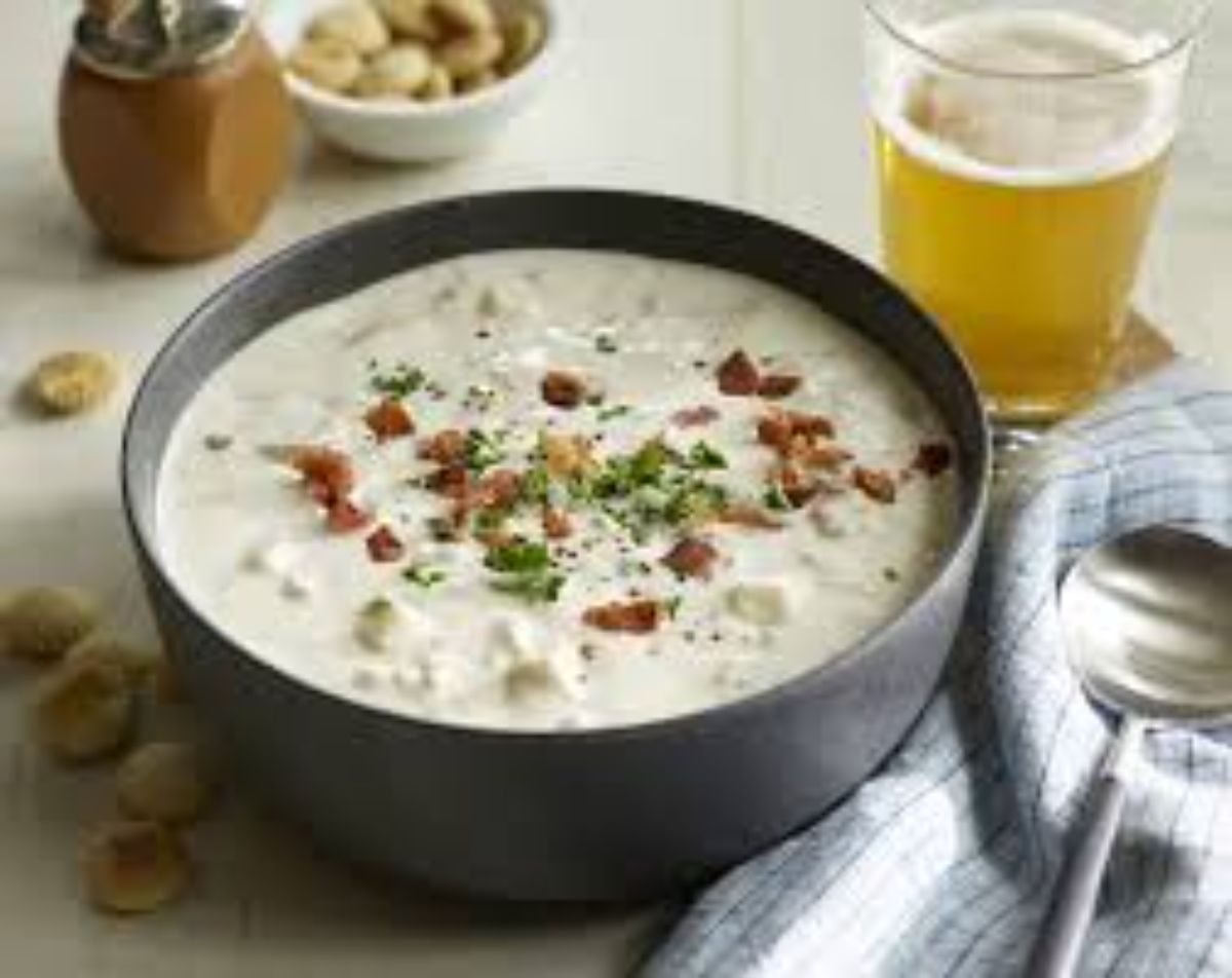 Cozy Puget Sound view, steaming Seattle chowder bowl, inviting local flavor, hidden gem warmth.