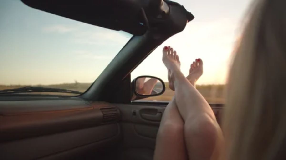 Majestic mountain vista, golden hour, epic journey from Henderson NV to Charlotte NC, boundless adventure.