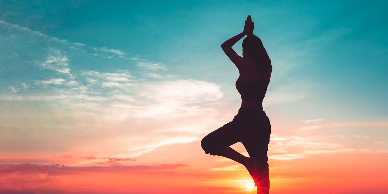 Vibrant LA cityscape at golden hour, hinting at exclusive, energetic fitness adventures.