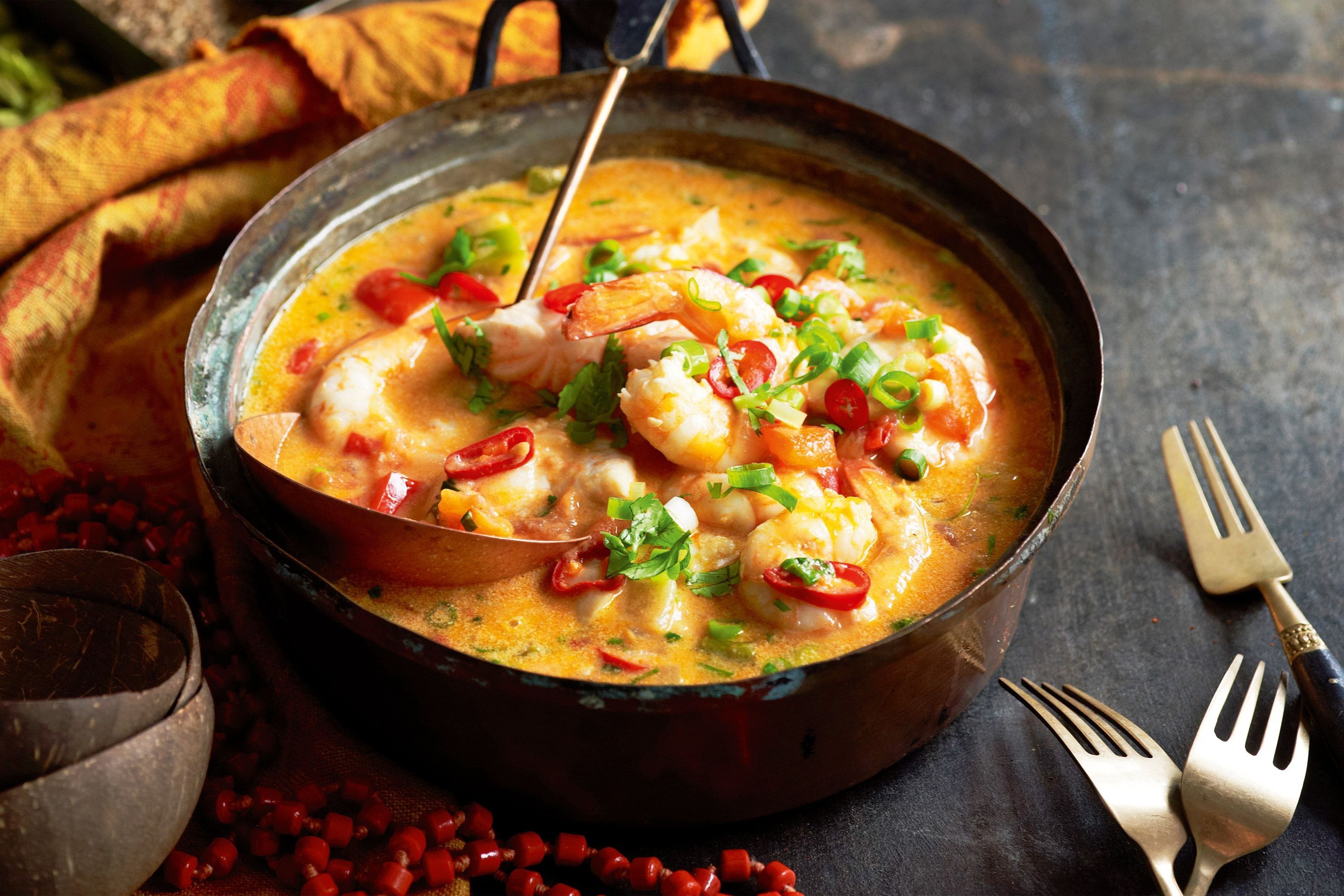 Vibrant Moqueca Baiana in Salvador, a fragrant, steamy seafood stew bursting with Bahia's tropical flavors.