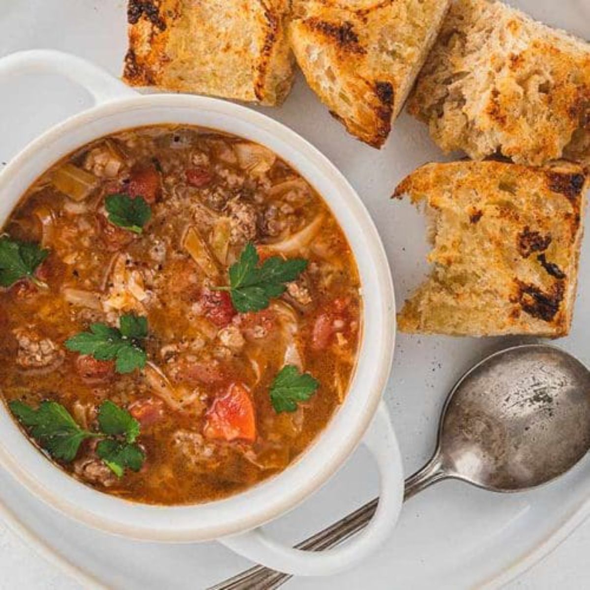 Hearty bison stew, Banff's cozy dining gem. Rustic comfort in a stunning Rocky Mountain setting.