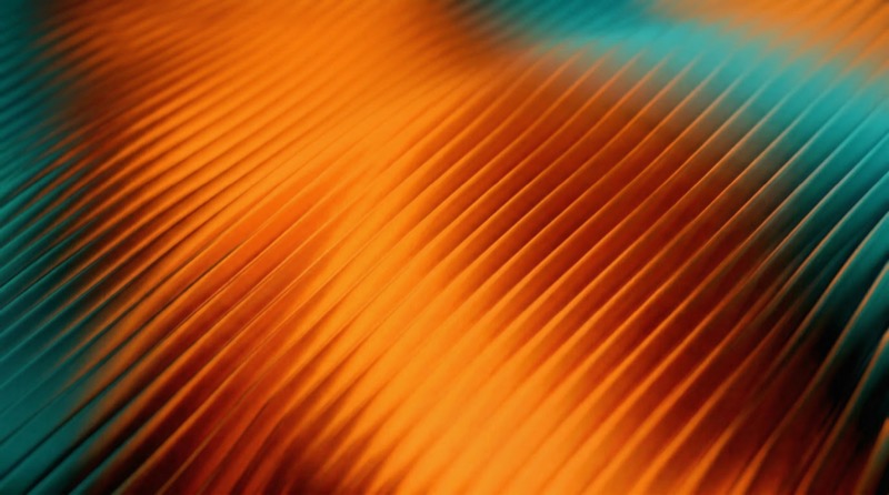 Abstract diagonal ridges in orange and teal