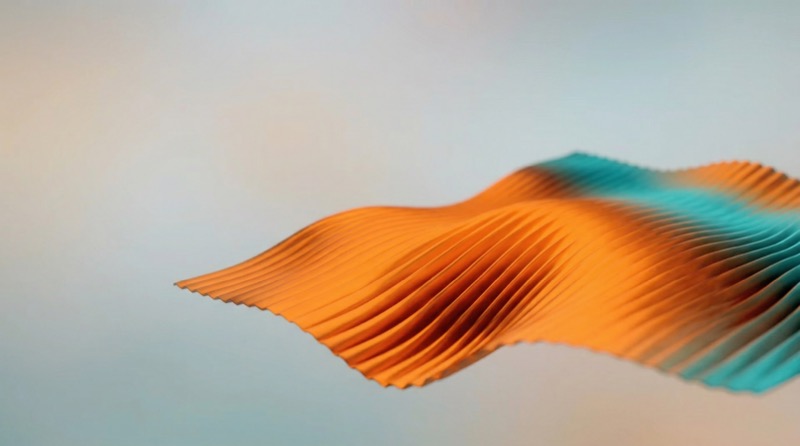 Abstract orange and teal pleated wave background