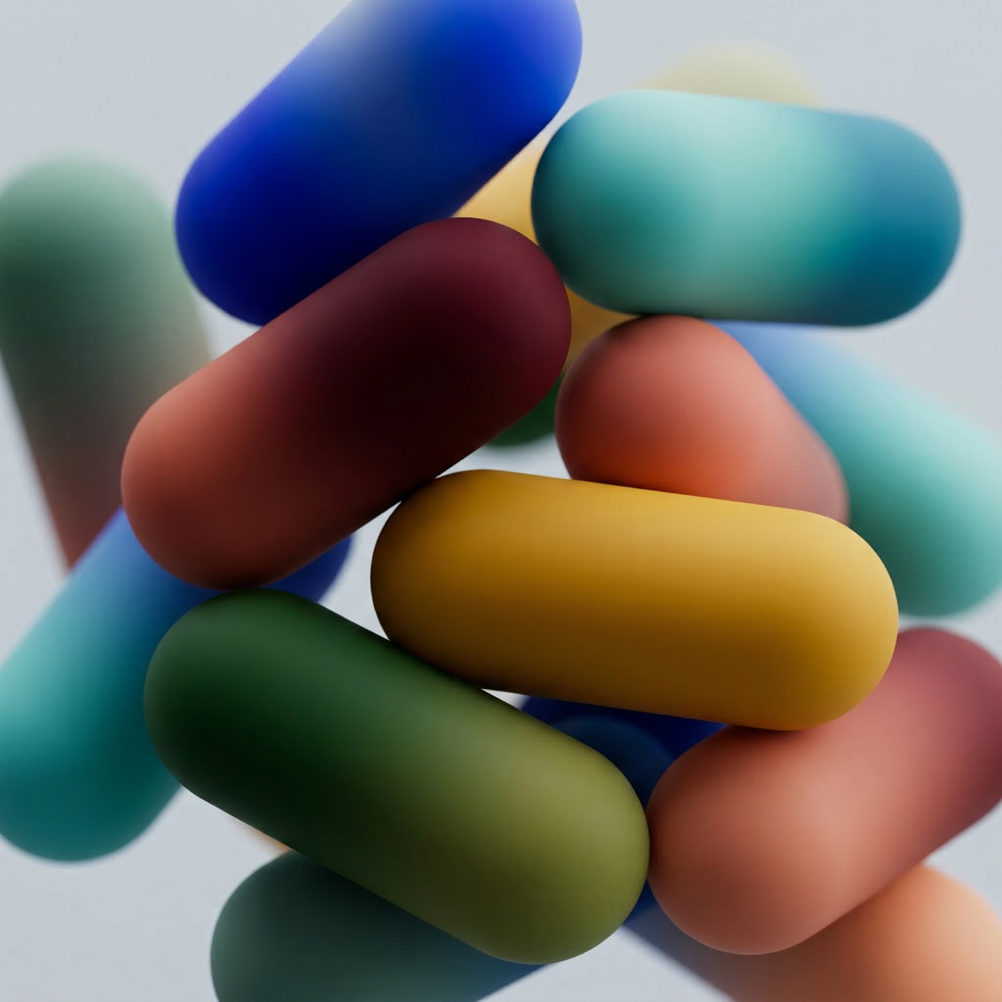 Colorful 3D abstract capsules on soft background