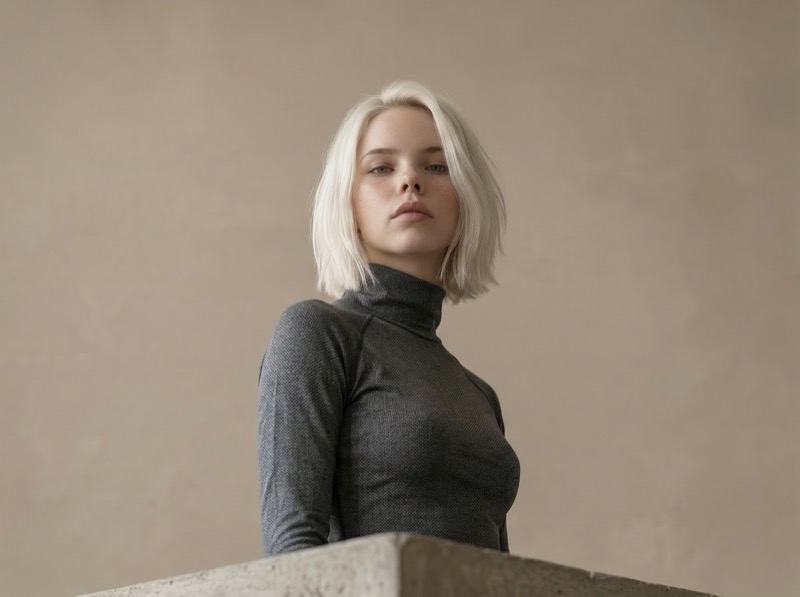 Minimalist portrait of blonde woman in turtleneck
