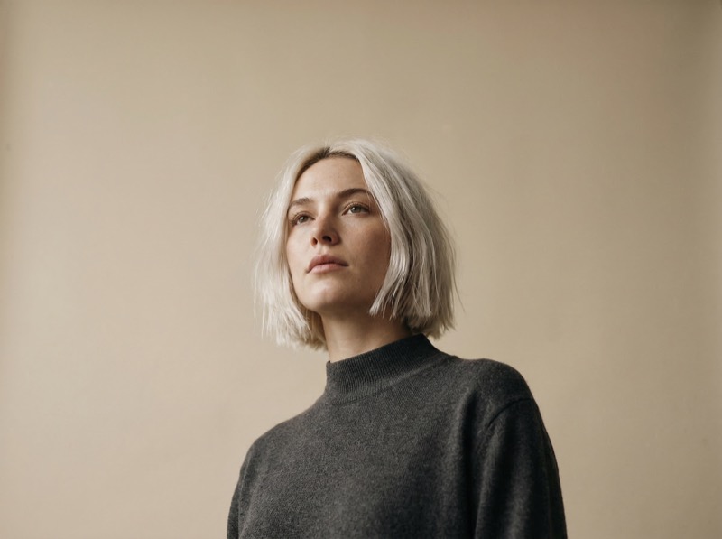 Minimalist portrait of woman with platinum bob