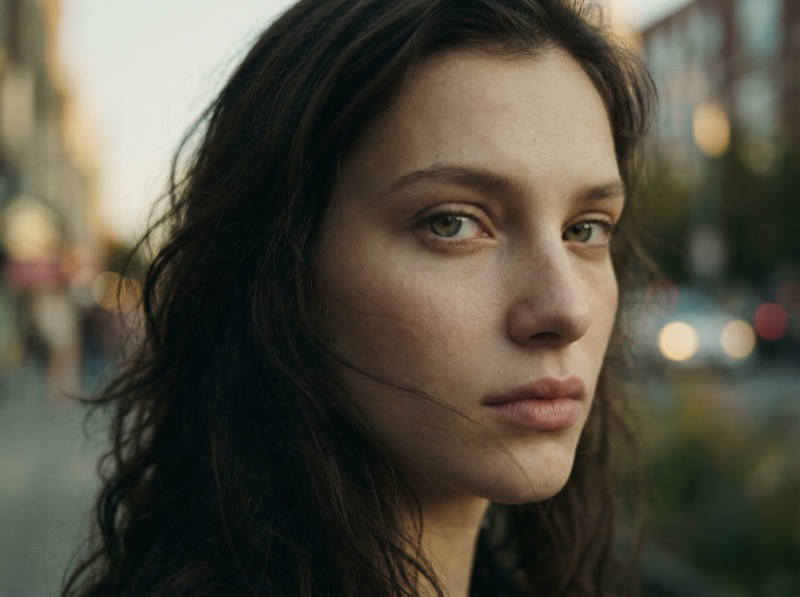 Moody close-up portrait on city street