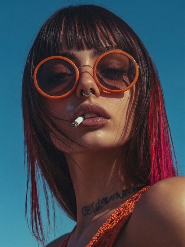 Retro sunglasses portrait with cigarette