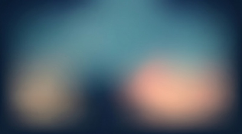 Soft Blue Gradient with Warm Bokeh Glow
