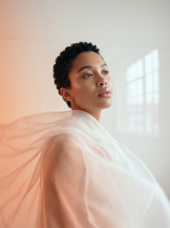 Soft light portrait with flowing sheer fabric