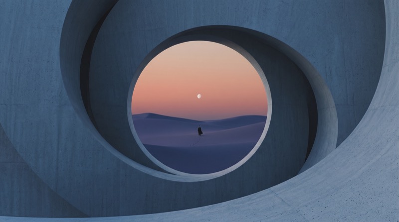 Surreal portal framing lone figure in desert