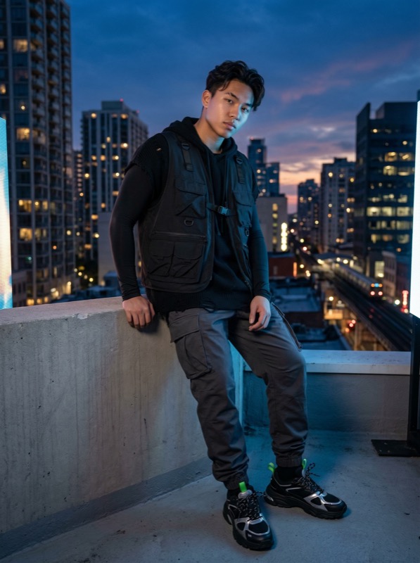 Urban rooftop portrait at dusk with city skyline - Image 1