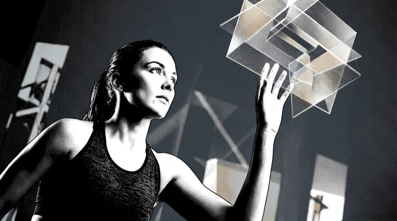 Woman Interacting with Abstract Geometric Shapes