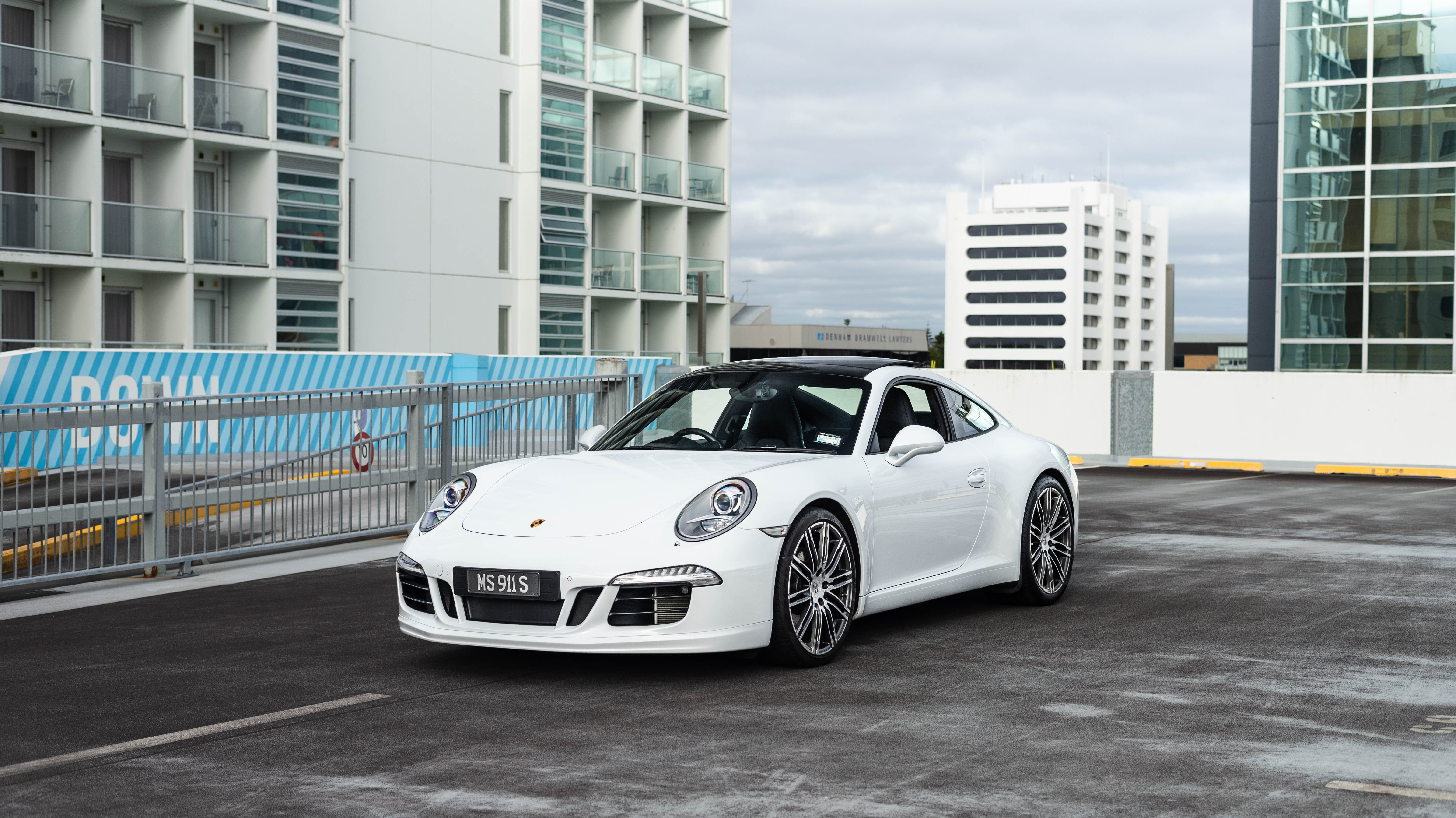Porsche 911 Carrera S available from MotorShare Auckland for a scenic drive to Piha
