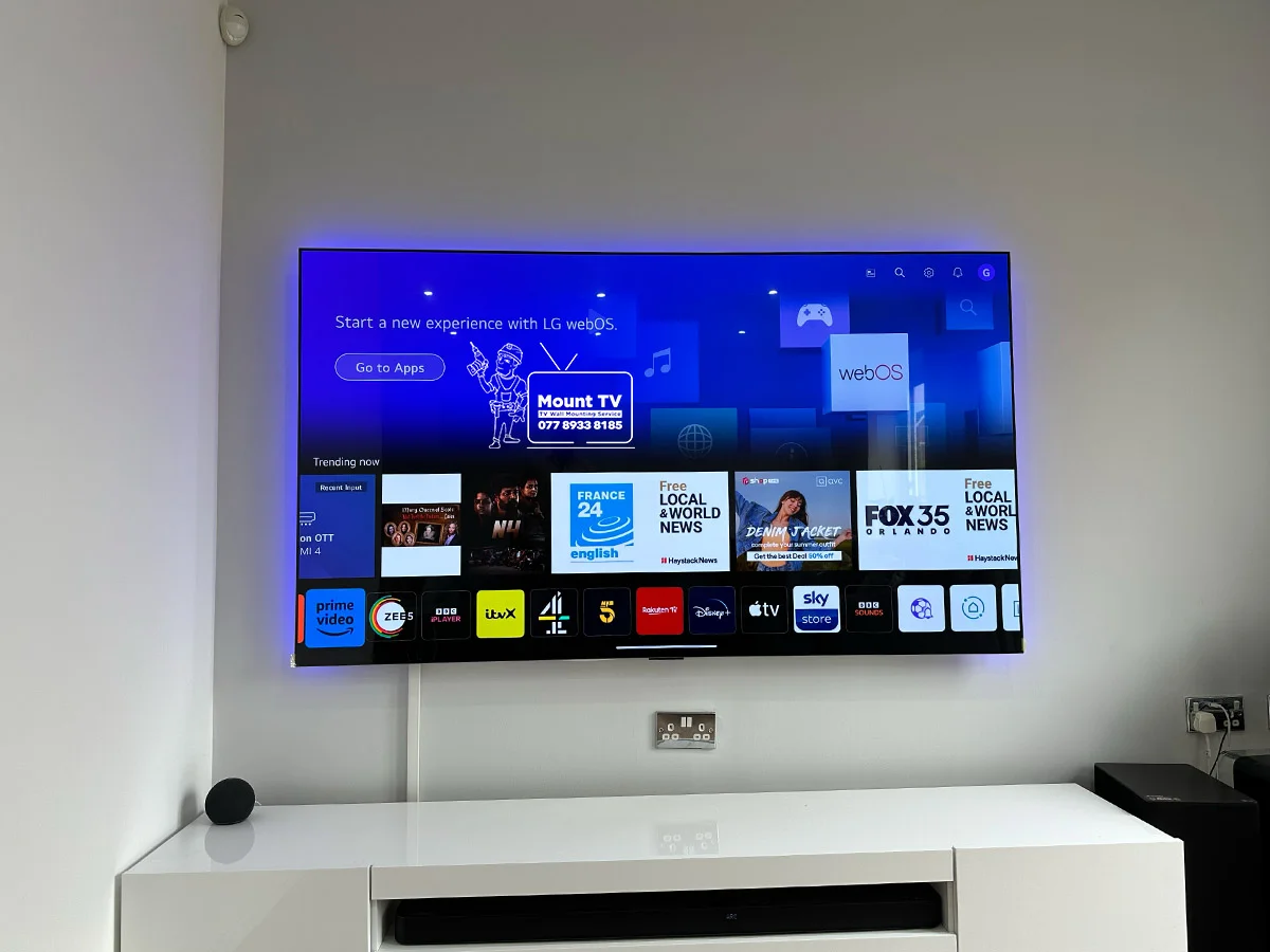 65 inch LG TV mounted on plasterboard wall in Colchester — professional installation by Mount TV