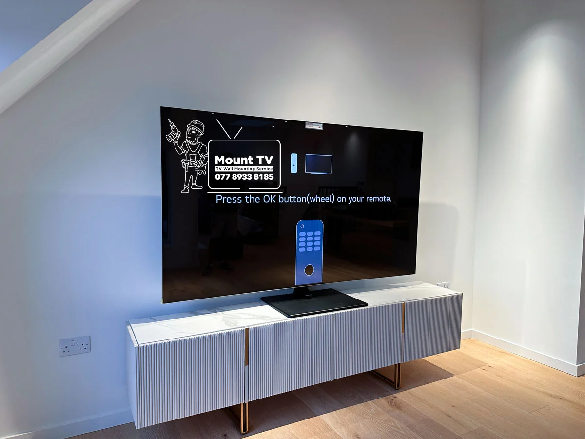 75" LG OLED TV installation — second angle, Canary Wharf