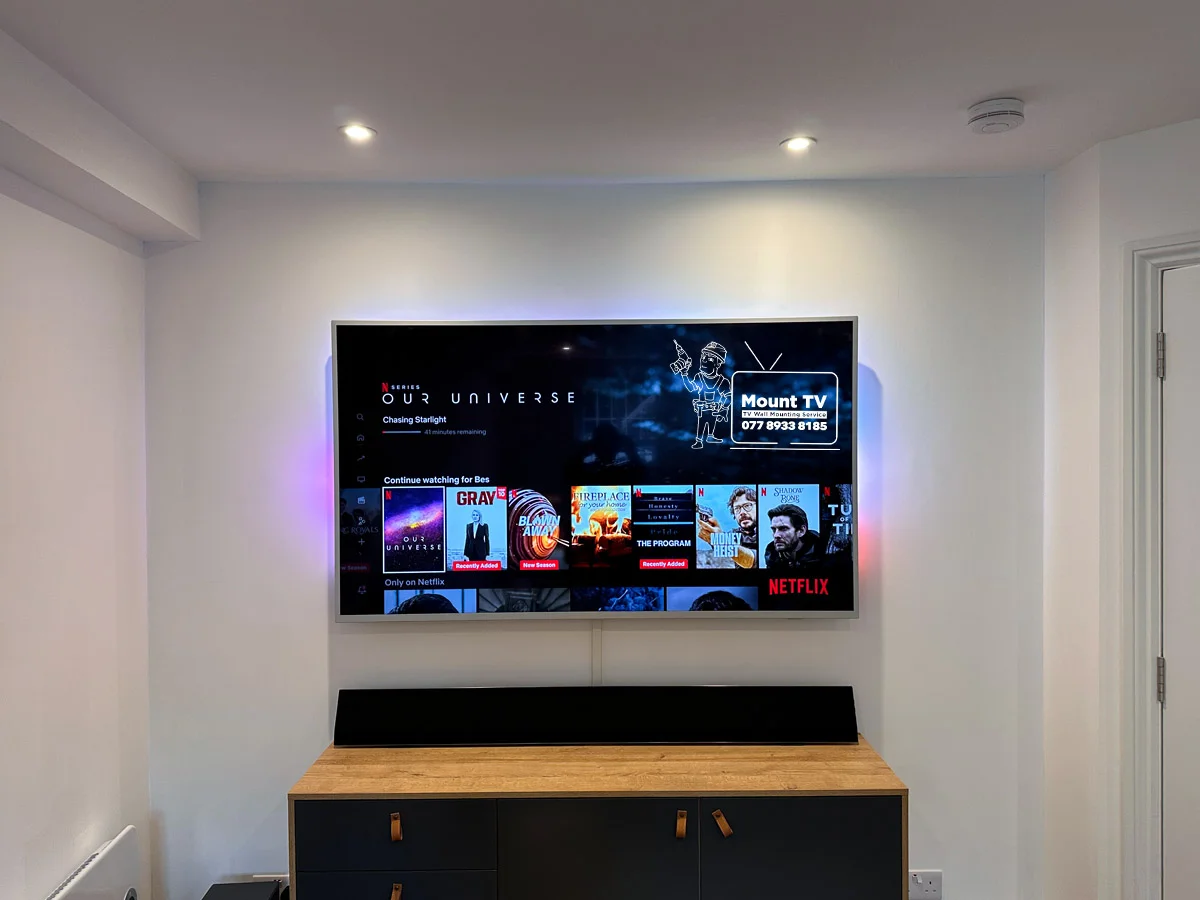 65" Philips ambient light TV installation — third angle, Stepney Green