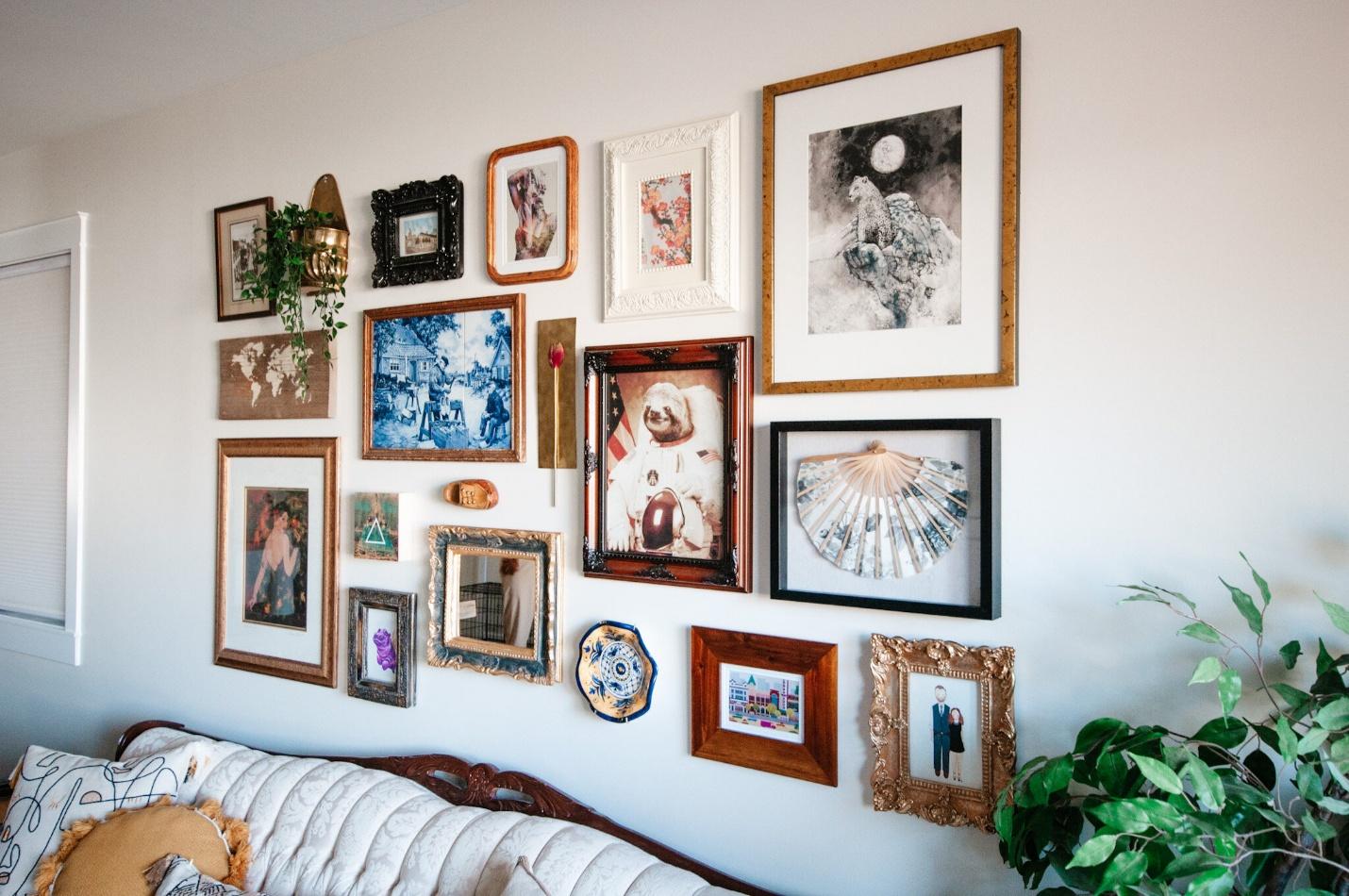 A wall with pictures on it

AI-generated content may be incorrect.