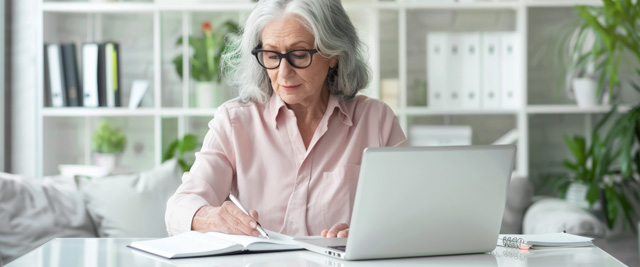 Grandmother writing an obituary.