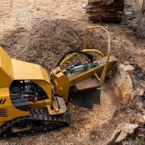 View from above on a yellow stump cutter equipped with tracks buford ga