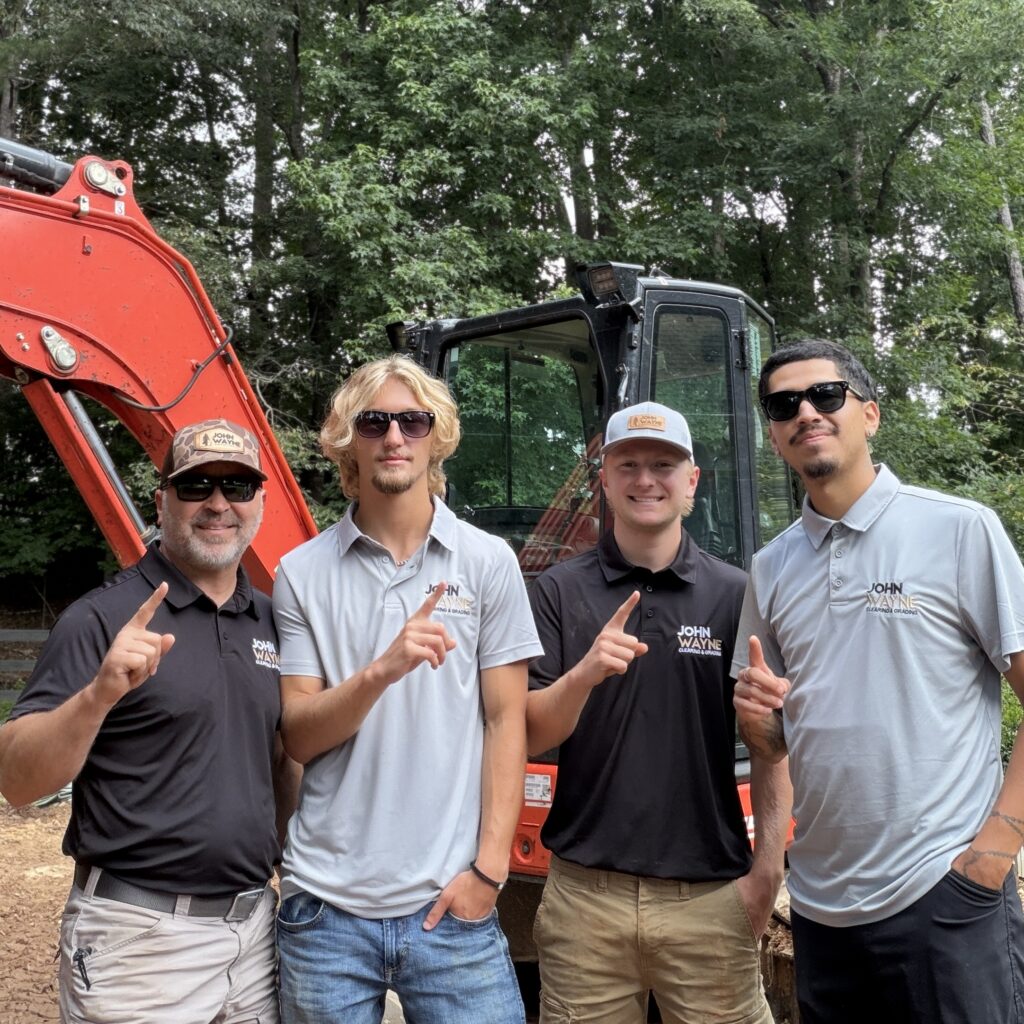 John wayne clearing grading team