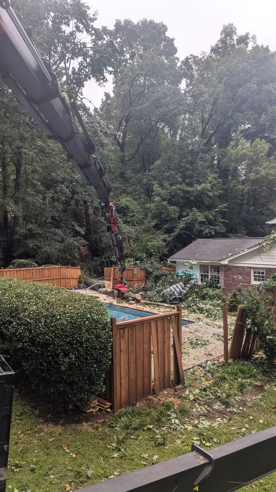 Atlanta ga crane lifting trunk sections pool deck