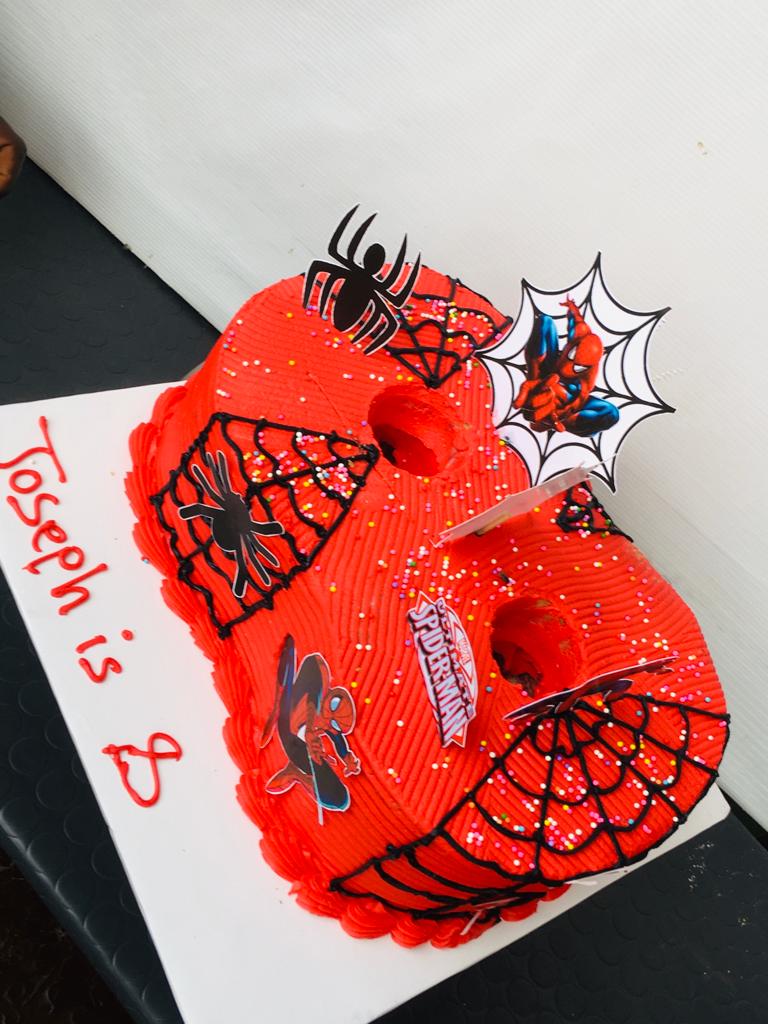 NUMBER 8 CAKE IN A SPIDERMAN CAKE CHARACTER.