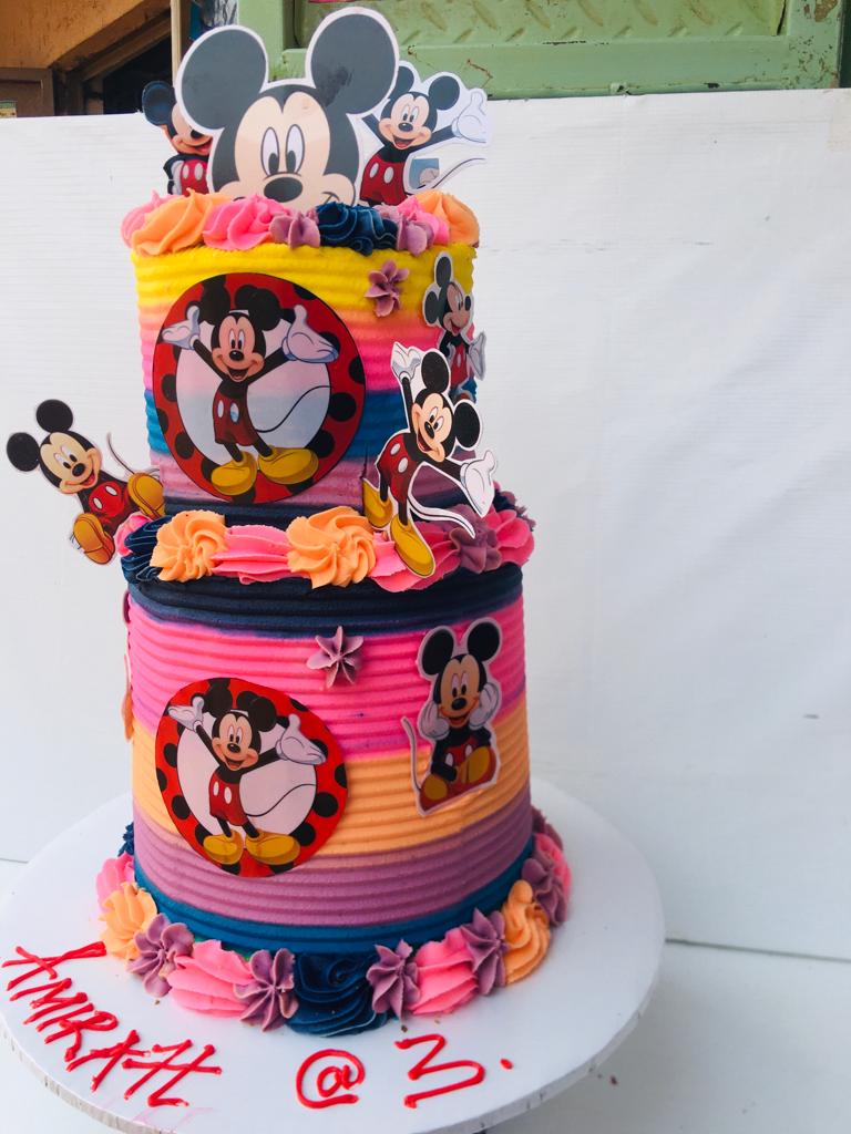 TWO TIER CHARACTER CAKES B