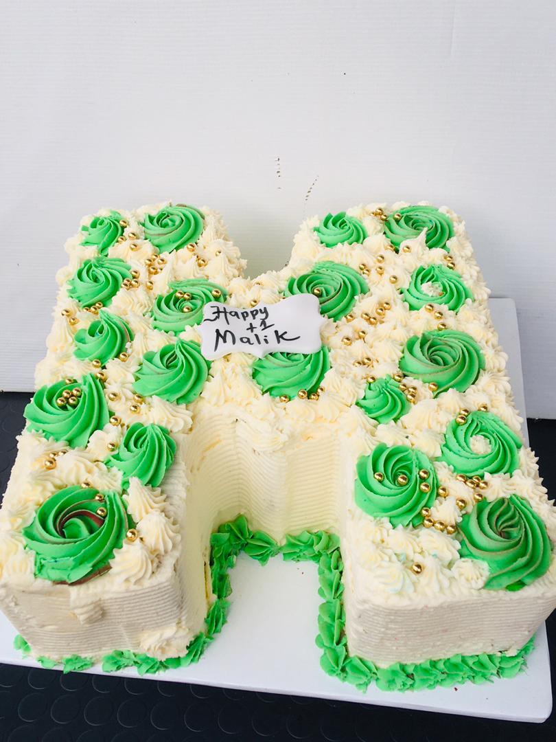 M SHAPED BIRTHDAY CAKE 