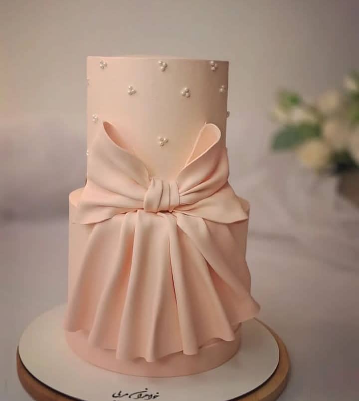 AMAZING BOW TIER CAKE 