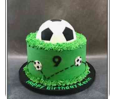 GREEN GRASS BUTTER FOOTBALL CAKE