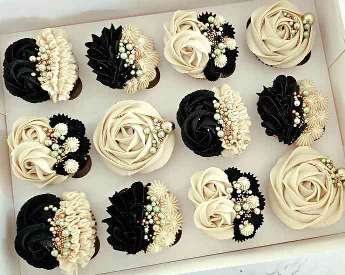 CREAM AND BLACK DESIGNED CUPCAKES 