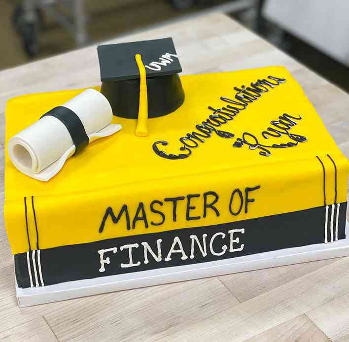 YELLOW BOOK ACCOUNTANT CAKE