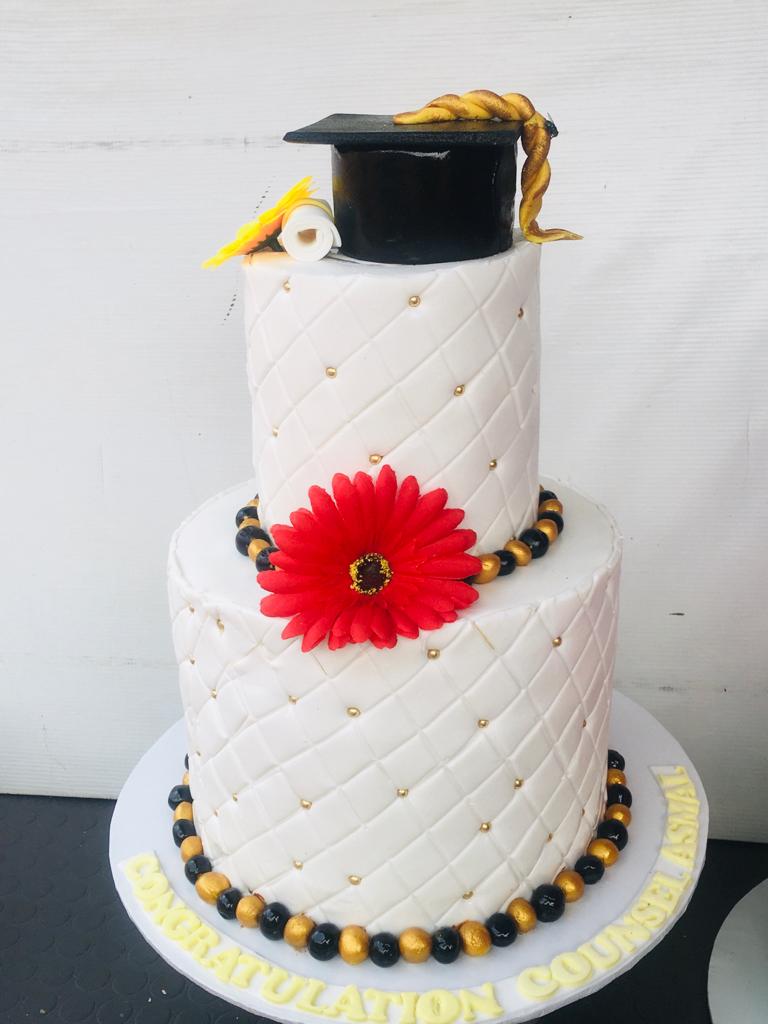 RED FLOWER GRADUATION CAKE