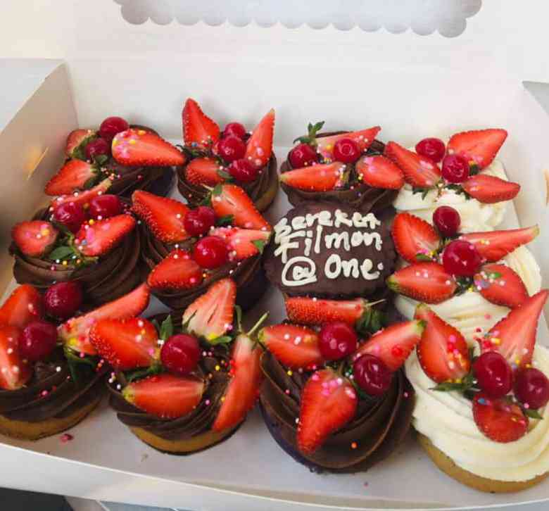 CHOCOLATE CUPCAKES TOPPED WITH STRAWBERRIES 