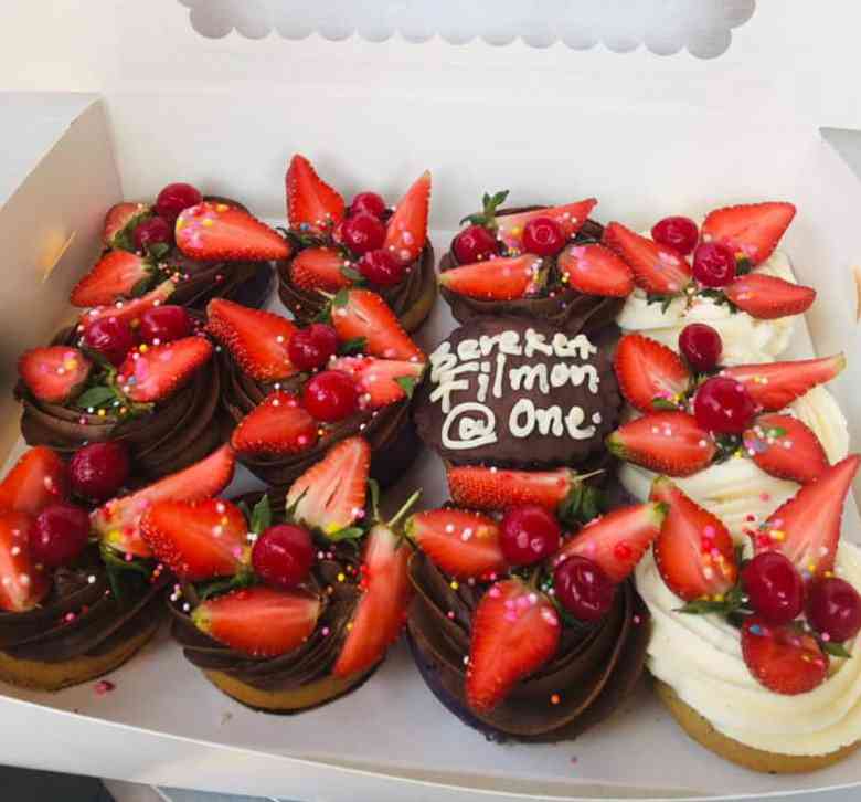 CHOCOLATE CUPCAKES TOPPED WITH STRAWBERRIES 