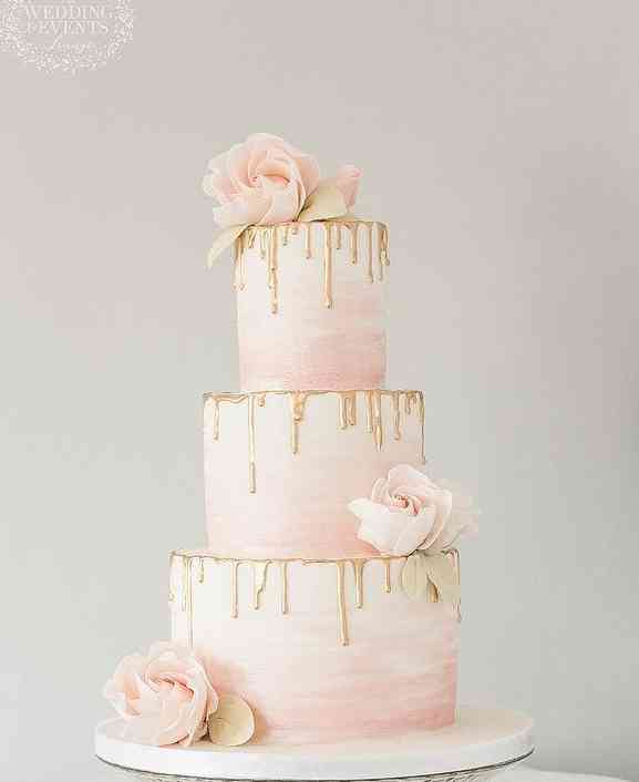 DRIPPED WEDDING CAKE WITH FLOWERS 