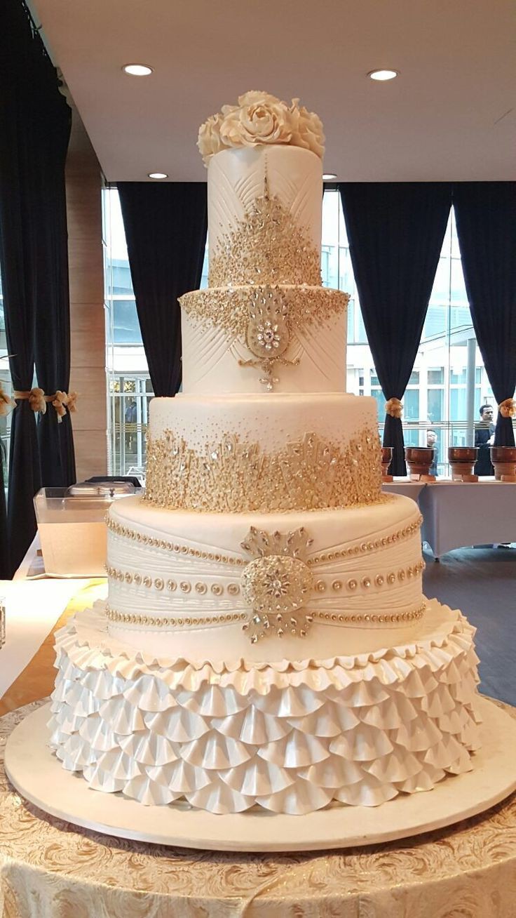 CREAM AND GOLD WEDDING CAKE 