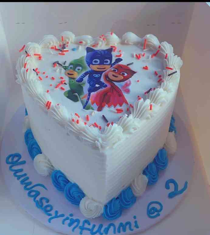 HEART SHAPED CHARACTER CAKE .N.N