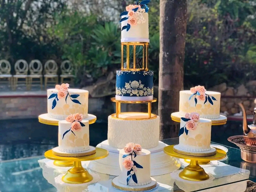 BLUE AND PEACH DECORATED FLORAL WEDDING CAKE 