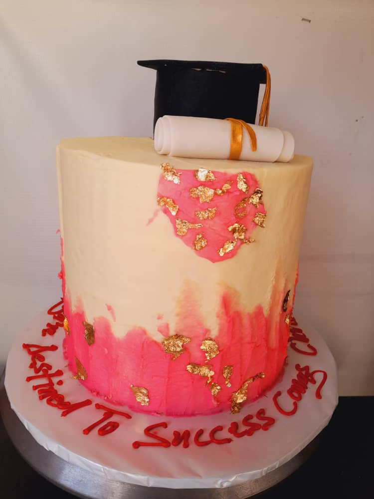 PINK GOLD CREAM GRADUATION CAKE 