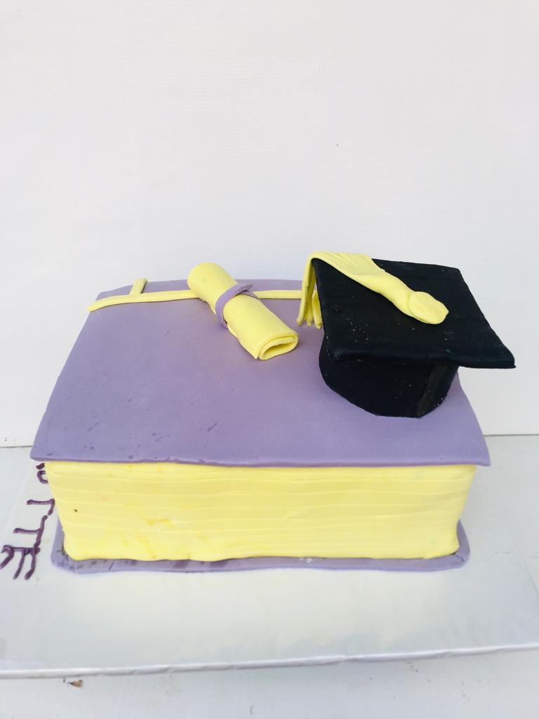 GRADUATION BOOK CAKE $6423