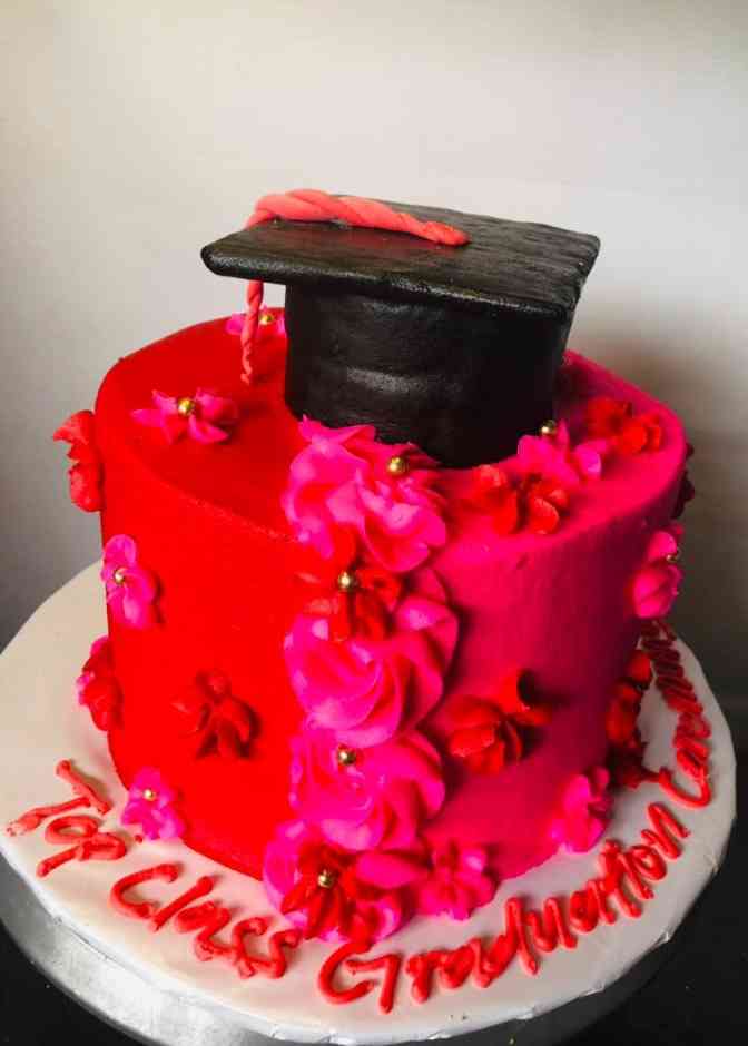 PINK AND RED GRADUATION CAKE 