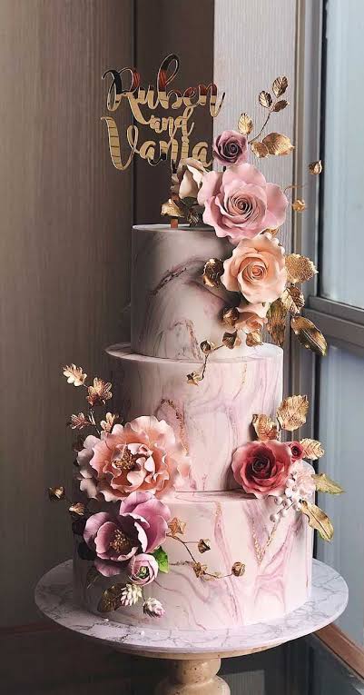 FLOWERED TIER PIECE WEDDING CAKES 