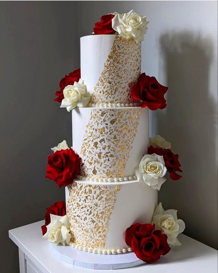 3 TIER LAVISH FLOWERED WEDDING CAKE 