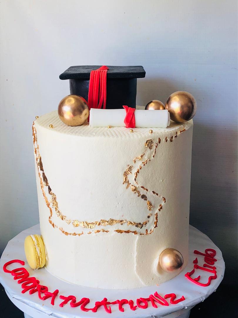 GOLD LEAFED BUTTER GRADUATION CAKE 